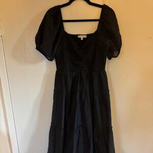 Black smocked top and puff sleve tiered maxi dress